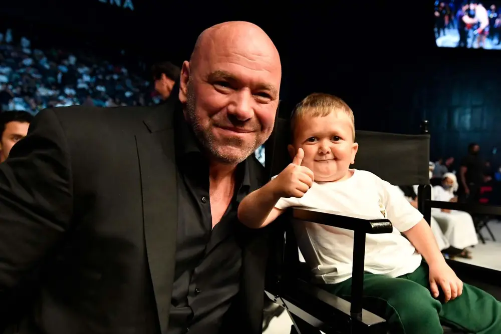 Hasbulla and UFC President Dana White cageside, Hasbulla giving a thumbs up